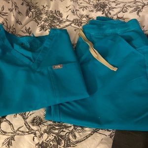 Figs scrub set, color is teal. Excellent condition.